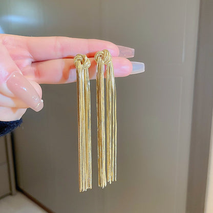 鋯石銀針樹葉流蘇耳環－46#銀針-金色款細節｜https://igowo.tw/