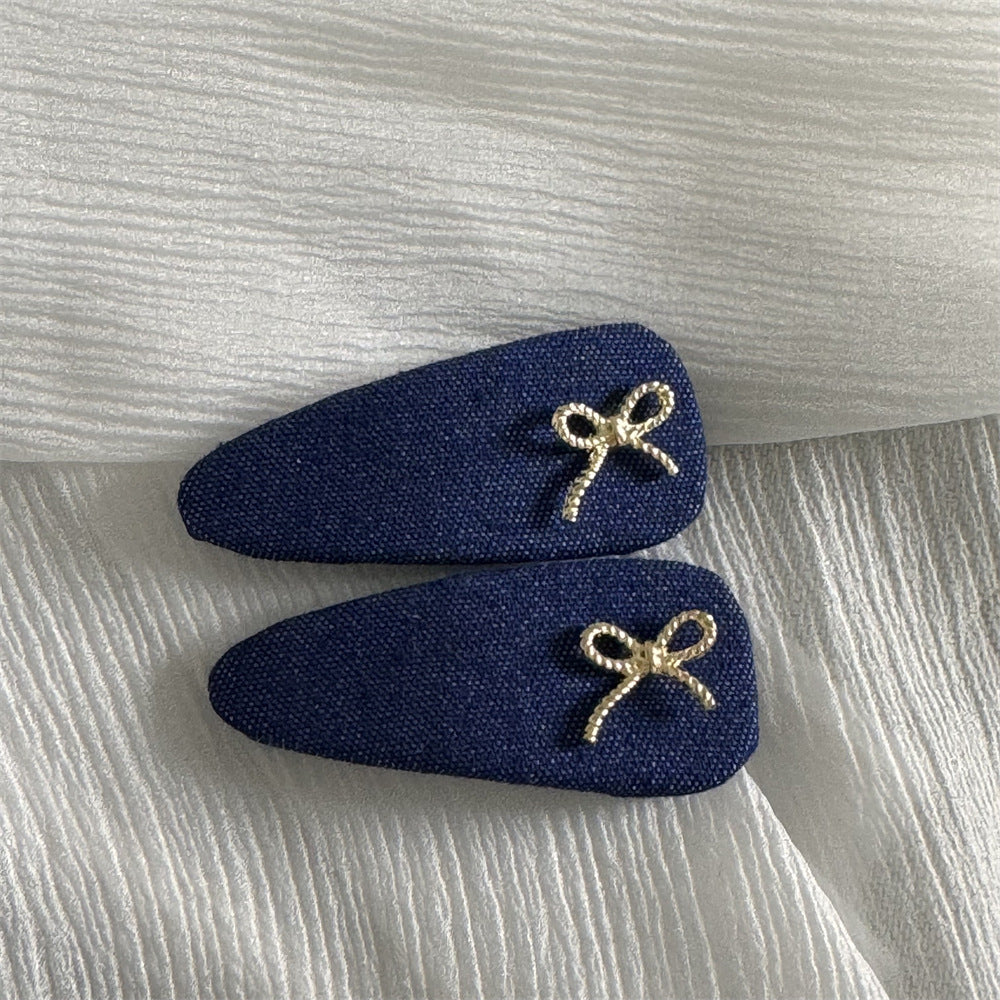 布面蝴蝶結髮夾－細節特寫5｜https://igowo.tw/