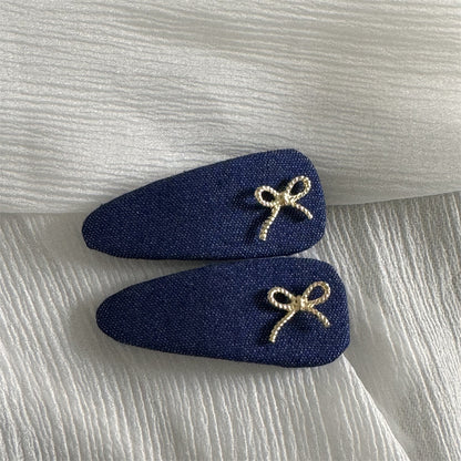 布面蝴蝶結髮夾－細節特寫5｜https://igowo.tw/
