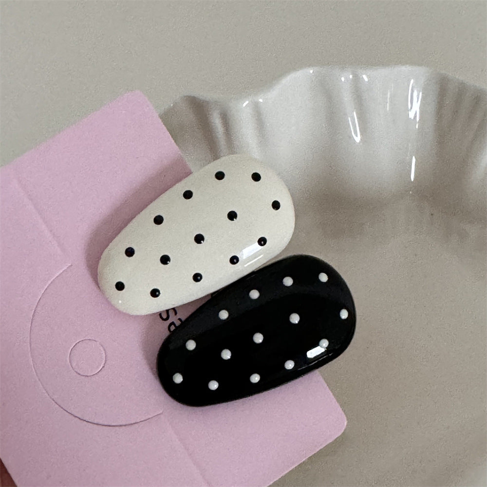 金屬波點蝴蝶結髮夾－細節特寫4｜https://igowo.tw/
