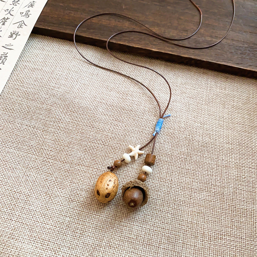 木質墜飾長版項鍊－6#項鍊-咖色款細節｜https://igowo.tw/