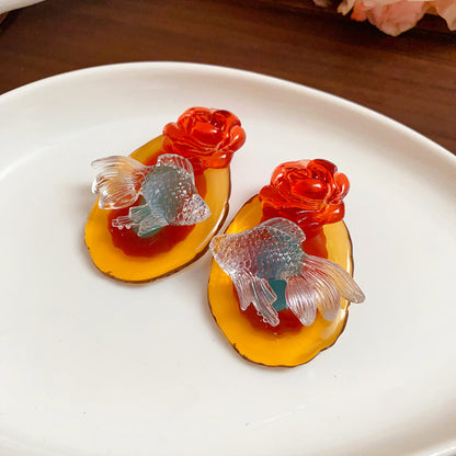 黃色樹脂花朵耳釘－細節特寫33｜https://igowo.tw/