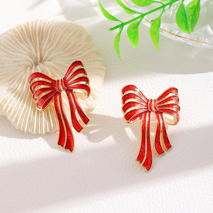 紅色金屬蝴蝶結耳環－第二視角實拍｜https://igowo.tw/