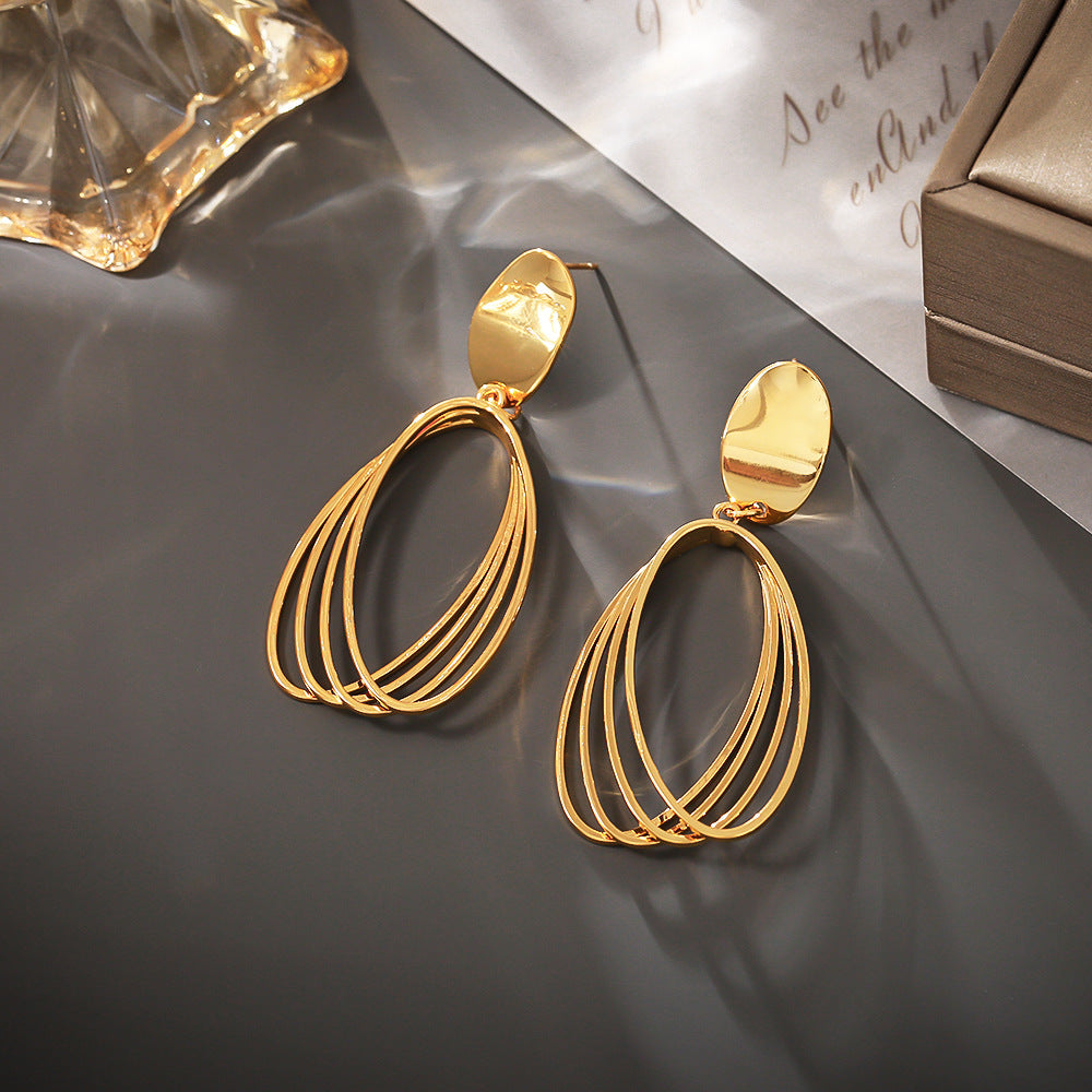 金屬橢圓長版簡約耳釘－商品主圖｜https://igowo.tw/