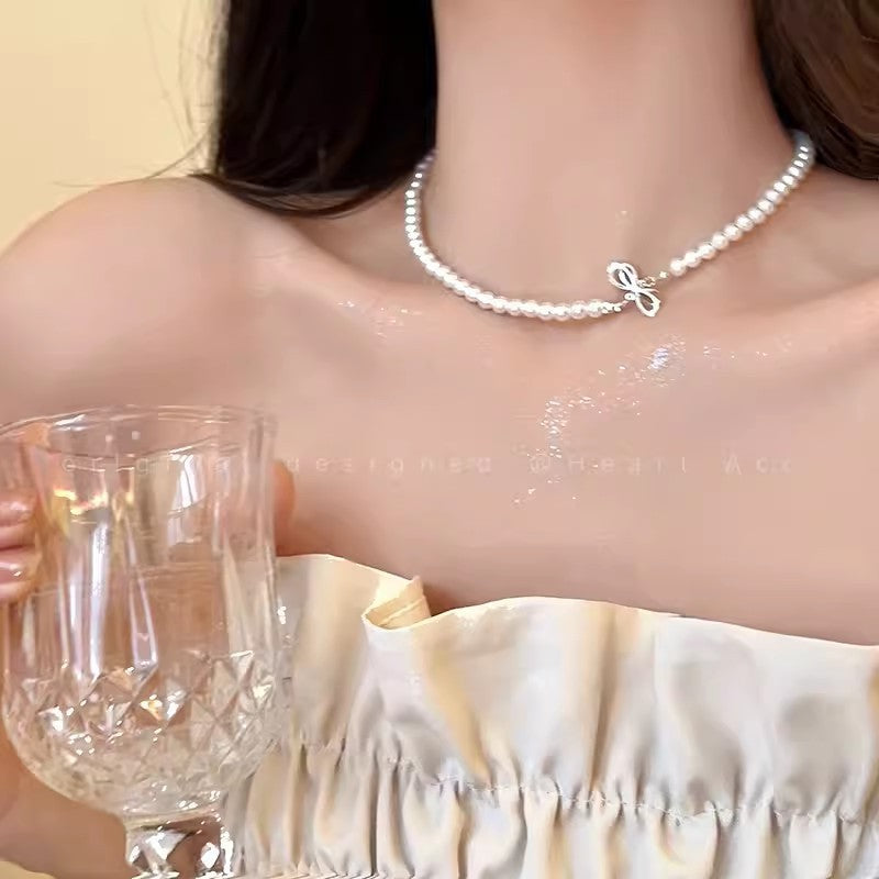 珍珠蝴蝶項鍊－商品主圖｜https://igowo.tw/