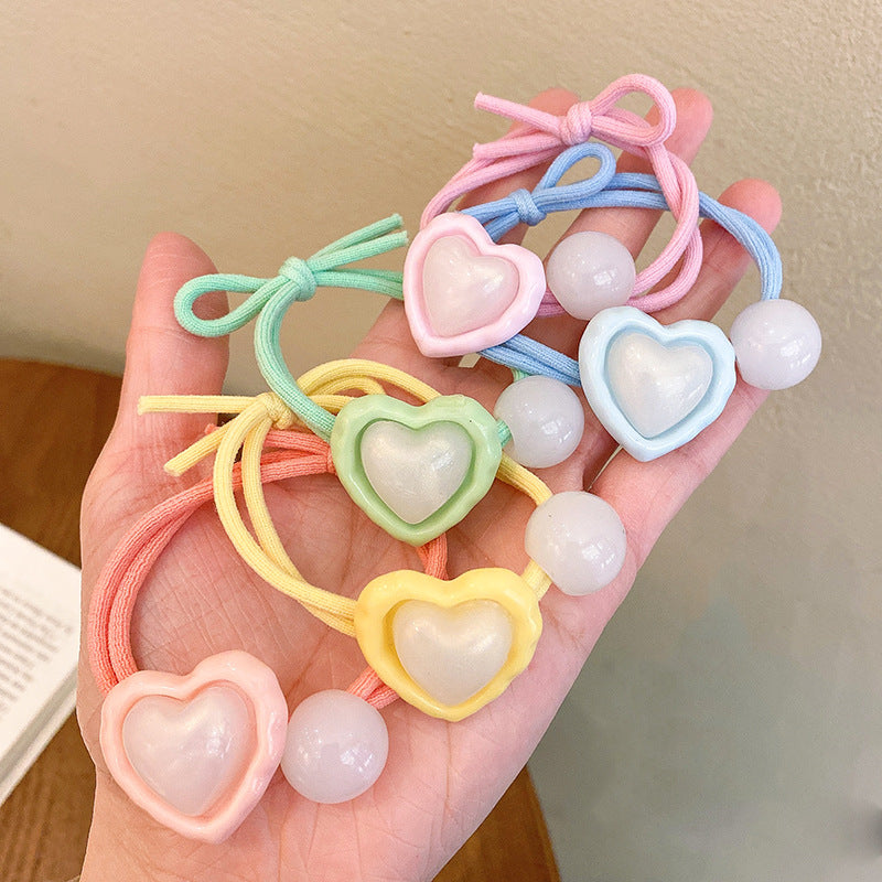 珍珠魚尾愛心髮圈－商品主圖｜https://igowo.tw/