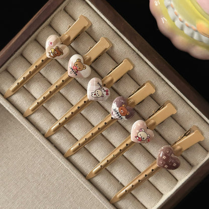 棕色金屬愛心小熊髮夾－商品主圖｜https://igowo.tw/