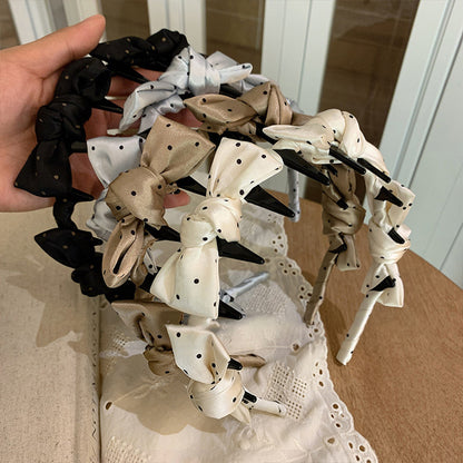 波點蝴蝶結髮箍－商品主圖｜https://igowo.tw/