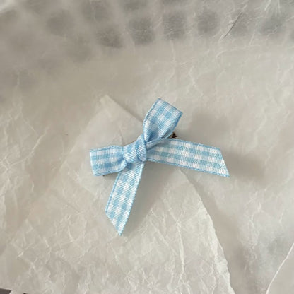 粉色蝴蝶結髮夾