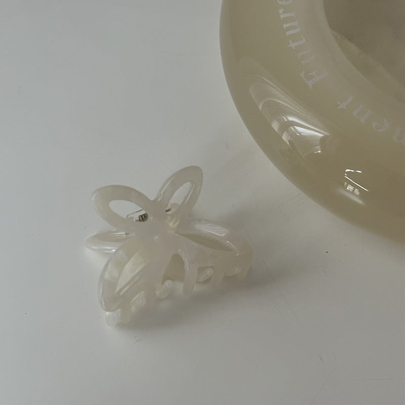 醋酸板材蝴蝶鯊魚夾－蝴蝶小抓-粉色款細節｜https://igowo.tw/