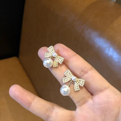 蝴蝶結花朵耳環－細節特寫34｜https://igowo.tw/