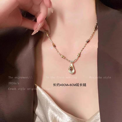 棕色虎眼石長版項鍊－金款細節｜https://igowo.tw/