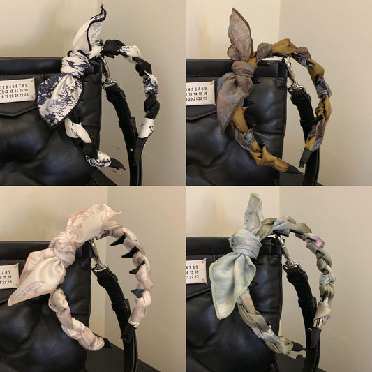 壓克力蝴蝶結纏繞髮箍－商品主圖｜https://igowo.tw/