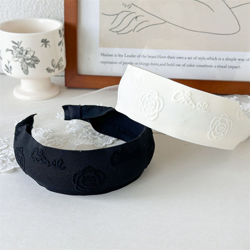 山茶花簡約髮箍－商品主圖｜https://igowo.tw/
