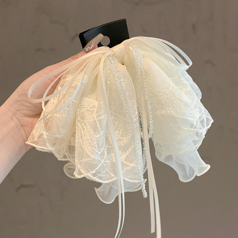 水晶蝴蝶結刺繡鯊魚夾－商品主圖｜https://igowo.tw/