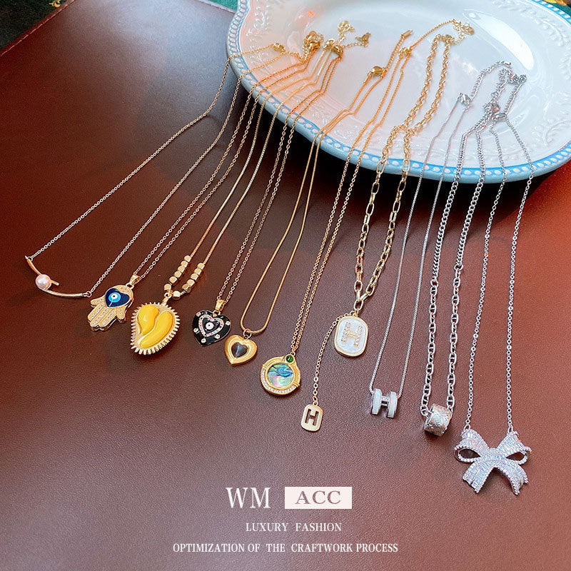 鋯石鈦鋼愛心簡約項鍊－商品主圖｜https://igowo.tw/
