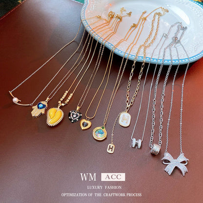 鋯石鈦鋼愛心簡約項鍊－商品主圖｜https://igowo.tw/