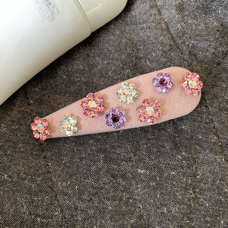 水晶鋯石花朵水滴髮夾－紫色款細節｜https://igowo.tw/