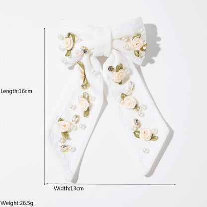 珍珠愛心花朵簡約髮夾－白色花朵款實拍｜https://igowo.tw/