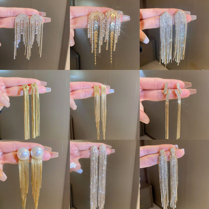 鋯石銀針樹葉流蘇耳環－商品主圖｜https://igowo.tw/