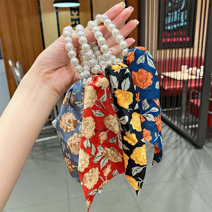 珍珠豹紋蝴蝶結髮圈