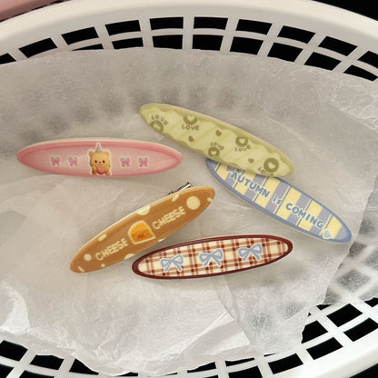 黃色小熊橢圓髮夾－商品主圖｜https://igowo.tw/