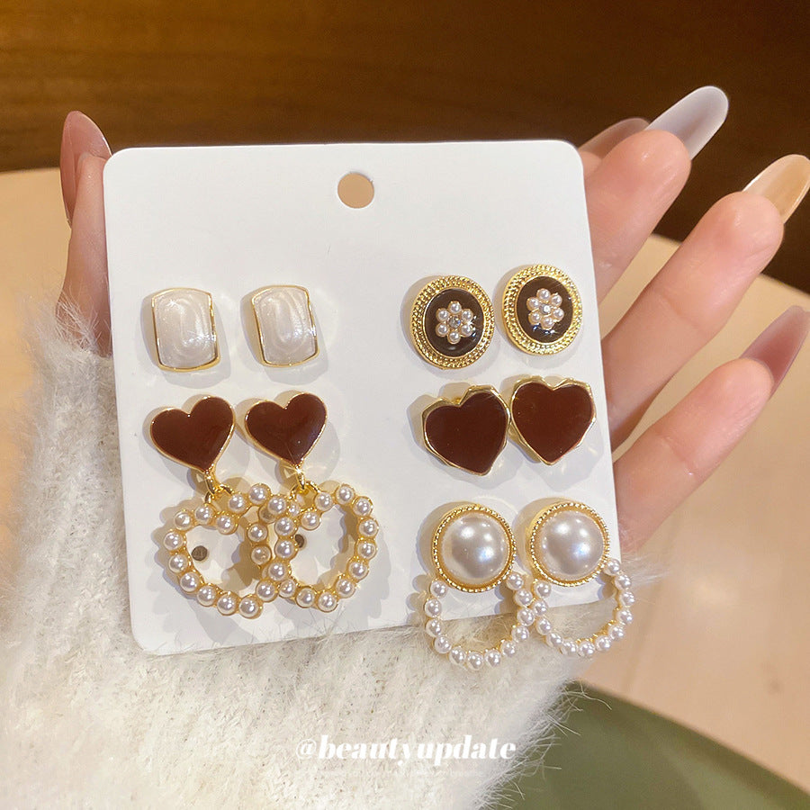 珍珠銀針花朵鑲鑽耳釘－細節特寫52｜https://igowo.tw/