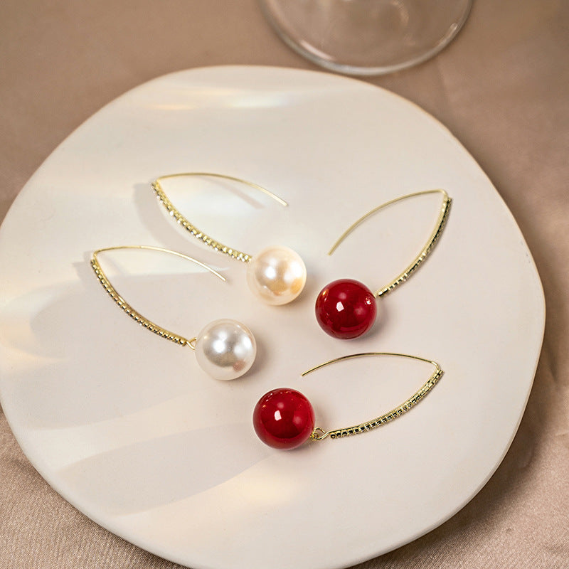 珍珠鋯石流蘇鑲鑽耳鉤－商品主圖｜https://igowo.tw/