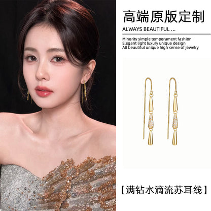 鋯石水滴流蘇耳線－商品主圖｜https://igowo.tw/