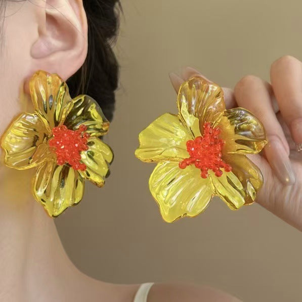 黃色壓克力花朵耳環－商品主圖｜https://igowo.tw/