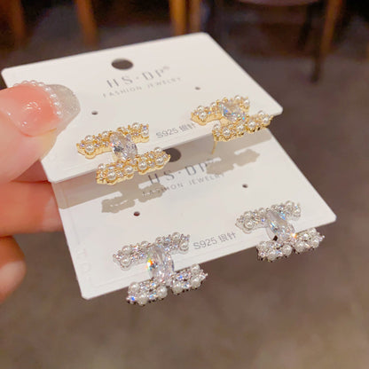 珍珠鋯石交叉鑲鑽耳環－商品主圖｜https://igowo.tw/