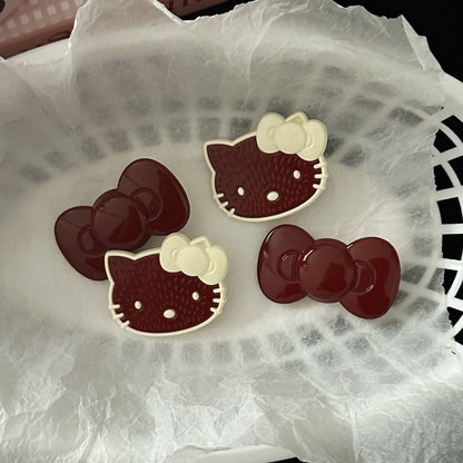 紅色貓咪蝴蝶結髮夾－商品主圖｜https://igowo.tw/