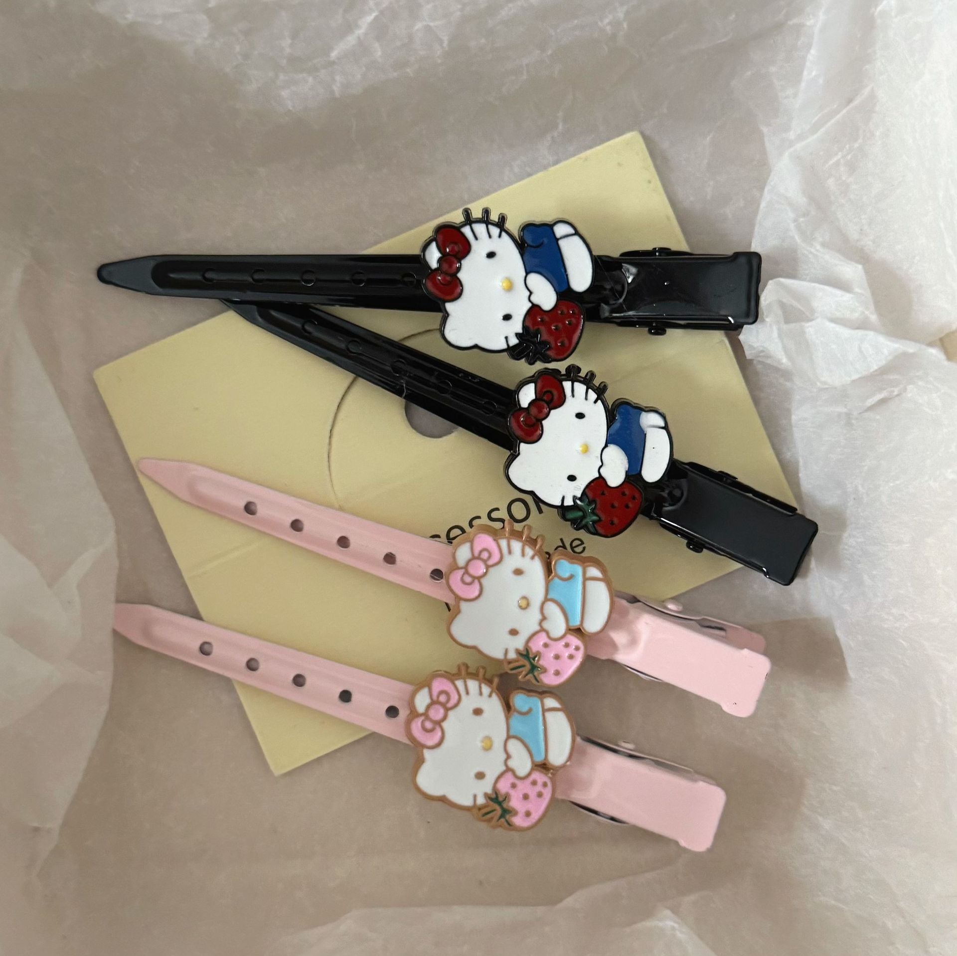 粉色草莓貓咪髮夾－商品主圖｜https://igowo.tw/