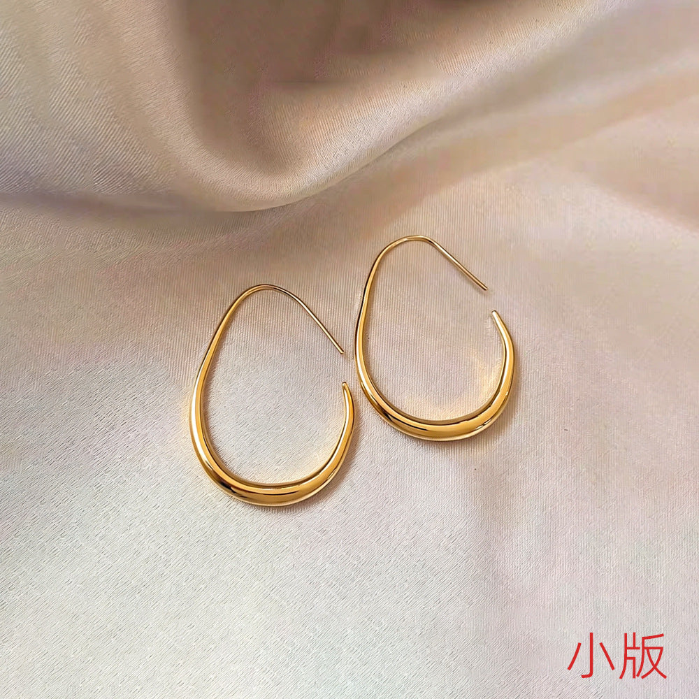 金色素圈誇張耳環－細節特寫79｜https://igowo.tw/