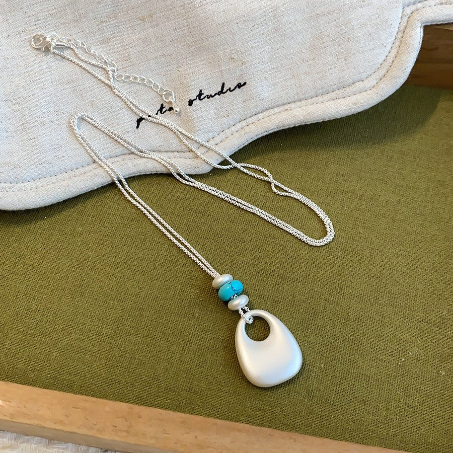 幾何拉絲墜飾項鍊－7#項鍊-銀色-褶皺愛心款細節｜https://igowo.tw/