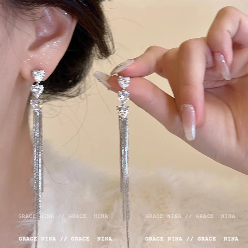 鋯石蝴蝶結流蘇耳環－銀款細節｜https://igowo.tw/