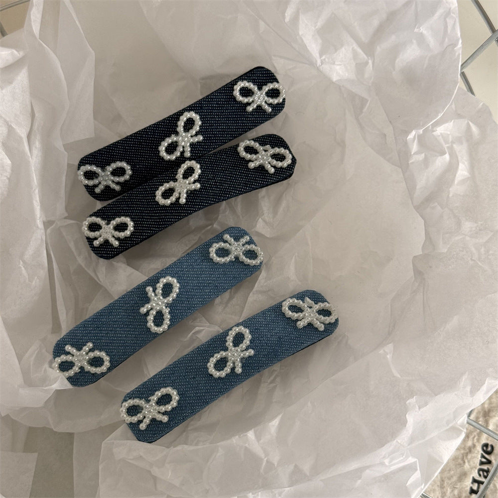 藍色珍珠蝴蝶結髮夾－細節特寫1｜https://igowo.tw/