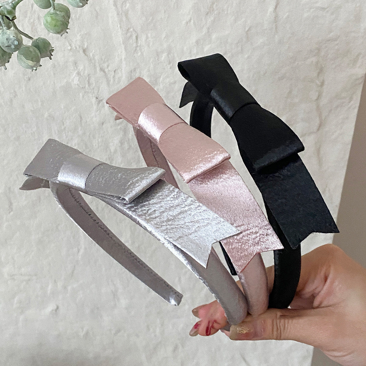 粉色蝴蝶結髮箍－商品主圖｜https://igowo.tw/