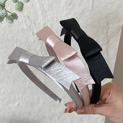 粉色蝴蝶結髮箍－商品主圖｜https://igowo.tw/