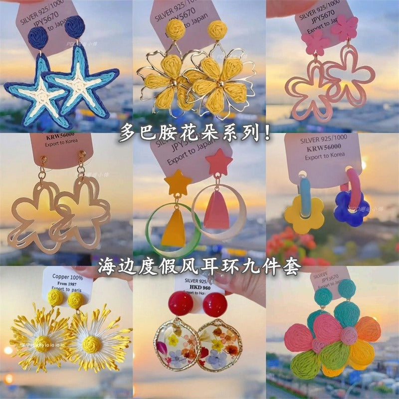 布面銀針花朵流蘇耳釘－商品主圖｜https://igowo.tw/