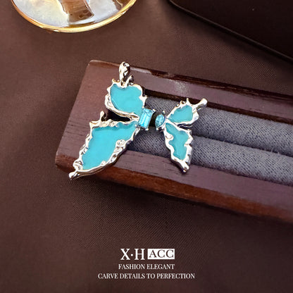 琺瑯蝴蝶不對稱耳釘