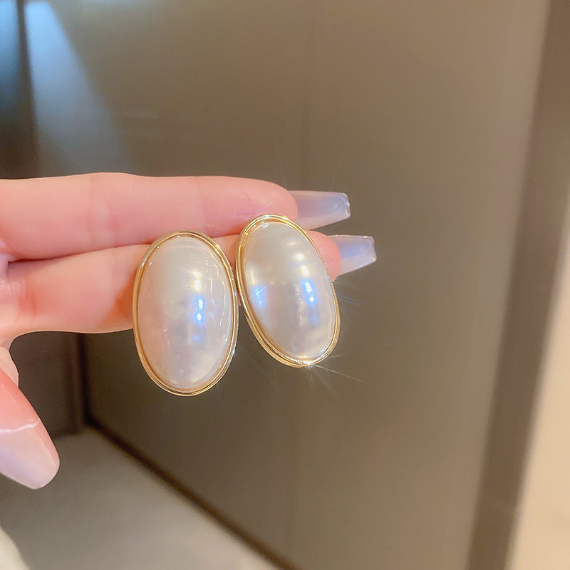 珍珠蝴蝶結流蘇耳墜－細節特寫7｜https://igowo.tw/