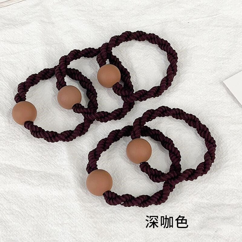 彈力繩簡約髮圈－卡其色1條款細節2｜https://igowo.tw/