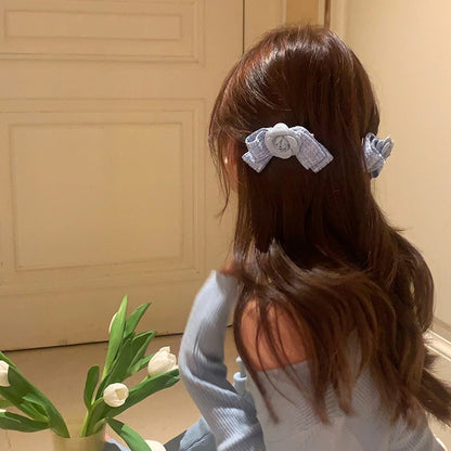 山茶花蝴蝶結髮夾－藍色（單個）款實拍｜https://igowo.tw/