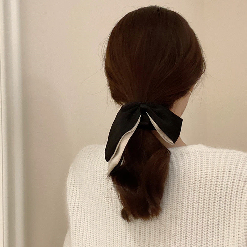 蝴蝶結雙層髮圈－商品主圖｜https://igowo.tw/