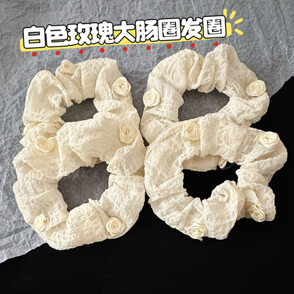 白色大腸圈花朵髮圈－商品主圖｜https://igowo.tw/