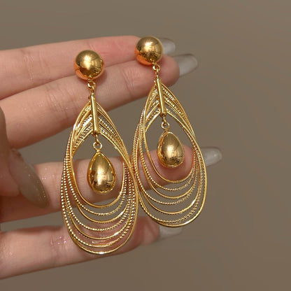 鋯石橢圓交叉流蘇耳鉤－25#鋼針-金色款細節25｜https://igowo.tw/