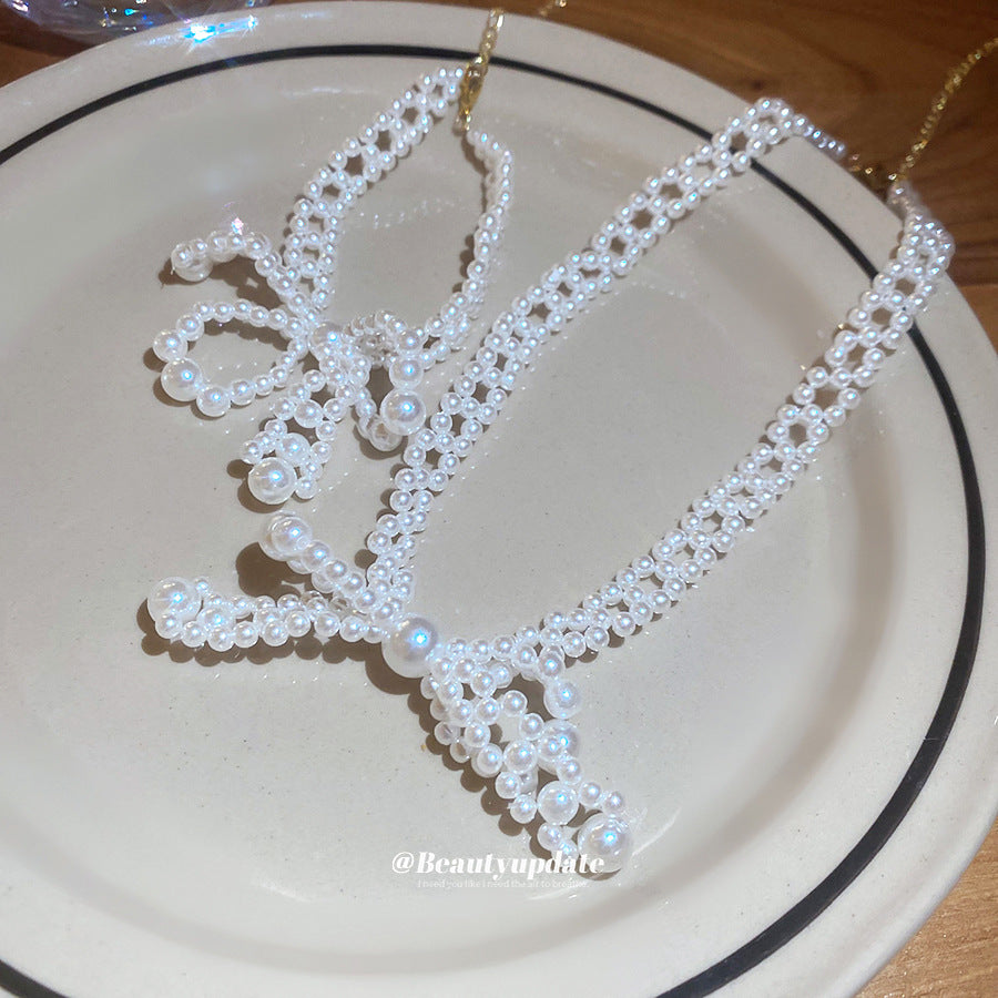 不銹鋼蝴蝶結珍珠串珠項鏈手鏈甜美優雅首飾套裝設計感小眾飾品女