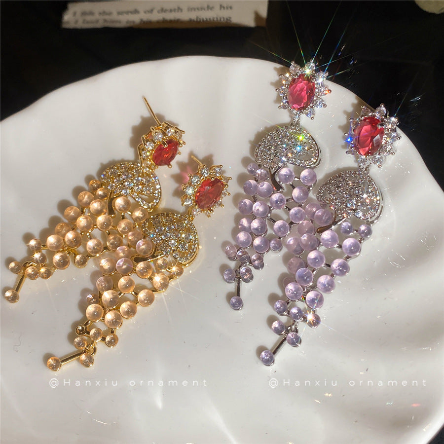 金色鋯石流蘇電鍍耳釘－商品主圖｜https://igowo.tw/