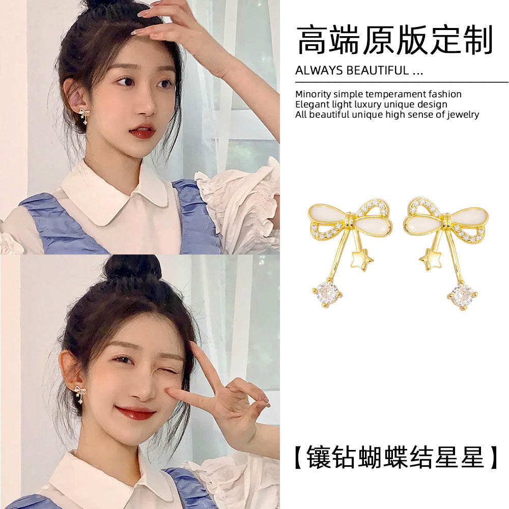 星星蝴蝶結鑲鑽耳釘－商品主圖｜https://igowo.tw/